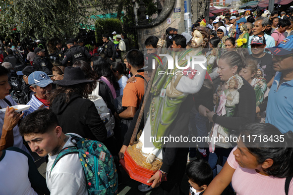 Devotees of Saint St. Jude Thaddeus attend the Church of San Hipolito to bless the images and give thanks for the favors granted in Mexico C...