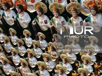 Images of Saint St. Jude Thaddeus are seen outside the Church of San Hipolito during the Saint St. Jude Thaddeus celebration day in Mexico C...