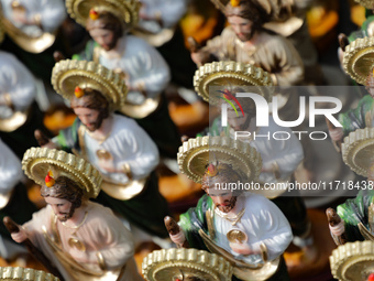 Images of Saint St. Jude Thaddeus are seen outside the Church of San Hipolito during the Saint St. Jude Thaddeus celebration day in Mexico C...