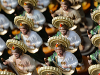 Images of Saint St. Jude Thaddeus are seen outside the Church of San Hipolito during the Saint St. Jude Thaddeus celebration day in Mexico C...