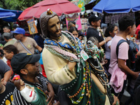 Devotees of Saint St. Jude Thaddeus attend the Church of San Hipolito to bless the images and give thanks for the favors granted in Mexico C...