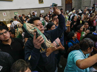 Devotees of Saint St. Jude Thaddeus attend the Church of San Hipolito to bless the images and give thanks for the favors granted in Mexico C...