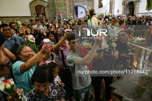 Devotees of Saint St. Jude Thaddeus attend the Church of San Hipolito to bless the images and give thanks for the favors granted in Mexico C...