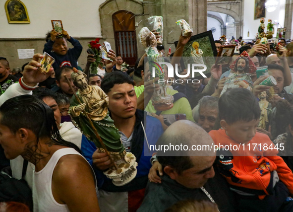 Devotees of Saint St. Jude Thaddeus attend the Church of San Hipolito to bless the images and give thanks for the favors granted in Mexico C...