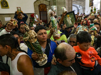 Devotees of Saint St. Jude Thaddeus attend the Church of San Hipolito to bless the images and give thanks for the favors granted in Mexico C...