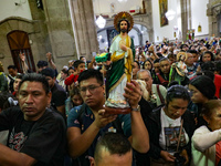 Devotees of Saint St. Jude Thaddeus attend the Church of San Hipolito to bless the images and give thanks for the favors granted in Mexico C...