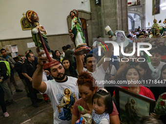 Devotees of Saint St. Jude Thaddeus attend the Church of San Hipolito to bless the images and give thanks for the favors granted in Mexico C...