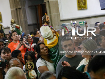 Devotees of Saint St. Jude Thaddeus attend the Church of San Hipolito to bless the images and give thanks for the favors granted in Mexico C...