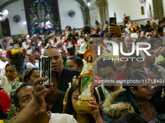 Devotees of Saint St. Jude Thaddeus attend the Church of San Hipolito to bless the images and give thanks for the favors granted in Mexico C...