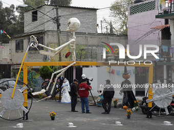 Residents of Santa Cecilia Tlahuac in Mexico City decorate public roads and houses on the eve of the Day of the Dead in Mexico City, on Octo...