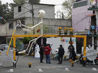 Residents of Santa Cecilia Tlahuac in Mexico City decorate public roads and houses on the eve of the Day of the Dead in Mexico City, on Octo...