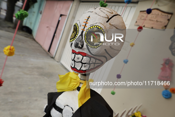 Residents of Santa Cecilia Tlahuac in Mexico City decorate public roads and houses on the eve of the Day of the Dead in Mexico City, on Octo...