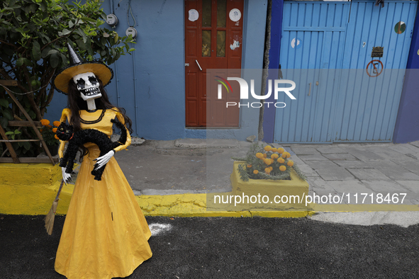 Residents of Santa Cecilia Tlahuac in Mexico City decorate public roads and houses on the eve of the Day of the Dead in Mexico City, on Octo...