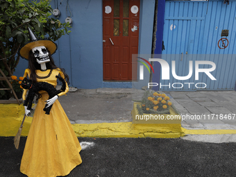 Residents of Santa Cecilia Tlahuac in Mexico City decorate public roads and houses on the eve of the Day of the Dead in Mexico City, on Octo...