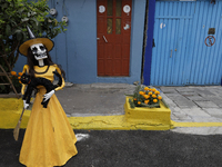 Residents of Santa Cecilia Tlahuac in Mexico City decorate public roads and houses on the eve of the Day of the Dead in Mexico City, on Octo...