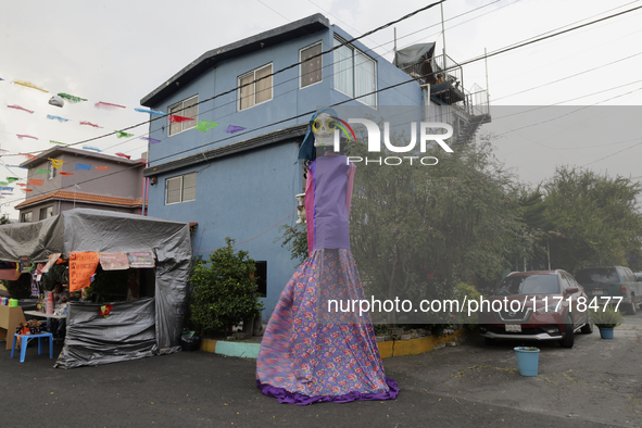 Residents of Santa Cecilia Tlahuac in Mexico City decorate public roads and houses on the eve of the Day of the Dead in Mexico City, on Octo...