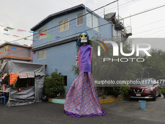 Residents of Santa Cecilia Tlahuac in Mexico City decorate public roads and houses on the eve of the Day of the Dead in Mexico City, on Octo...