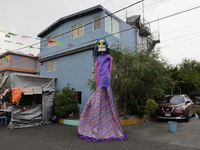 Residents of Santa Cecilia Tlahuac in Mexico City decorate public roads and houses on the eve of the Day of the Dead in Mexico City, on Octo...