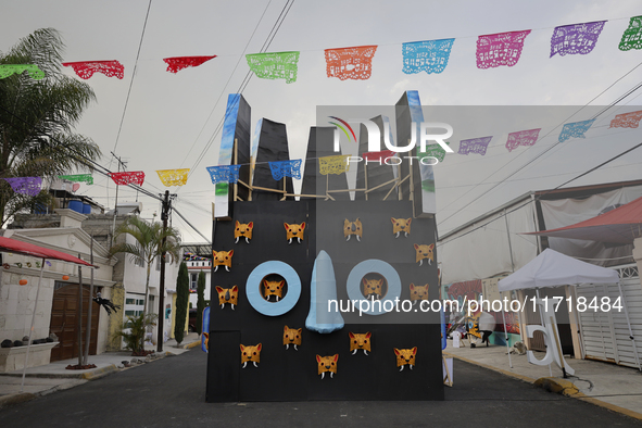 Residents of Santa Cecilia Tlahuac in Mexico City, Mexico, place pre-Hispanic decorations on public roads and houses on the eve of the Day o...