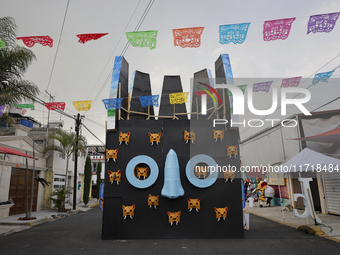 Residents of Santa Cecilia Tlahuac in Mexico City, Mexico, place pre-Hispanic decorations on public roads and houses on the eve of the Day o...