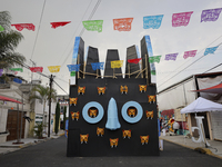 Residents of Santa Cecilia Tlahuac in Mexico City, Mexico, place pre-Hispanic decorations on public roads and houses on the eve of the Day o...