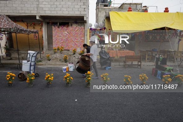 People attend to see decorations at Santa Cecilia Tlahuac in Mexico City, Mexico, on October 28, 2024, on the eve of Day of the Dead. 