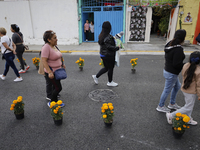 People attend to see decorations at Santa Cecilia Tlahuac in Mexico City, Mexico, on October 28, 2024, on the eve of Day of the Dead. (