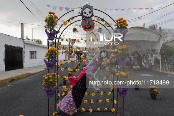 Residents of Santa Cecilia Tlahuac in Mexico City decorate public roads and houses on the eve of the Day of the Dead in Mexico City, on Octo...