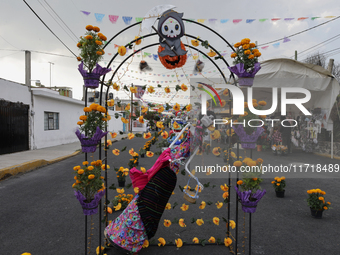 Residents of Santa Cecilia Tlahuac in Mexico City decorate public roads and houses on the eve of the Day of the Dead in Mexico City, on Octo...