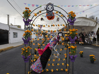 Residents of Santa Cecilia Tlahuac in Mexico City decorate public roads and houses on the eve of the Day of the Dead in Mexico City, on Octo...