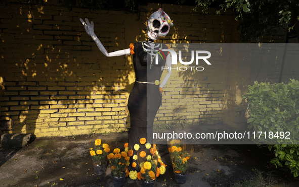 Residents of Santa Cecilia Tlahuac in Mexico City decorate public roads and houses on the eve of the Day of the Dead in Mexico City, on Octo...