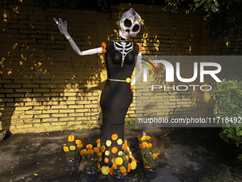 Residents of Santa Cecilia Tlahuac in Mexico City decorate public roads and houses on the eve of the Day of the Dead in Mexico City, on Octo...