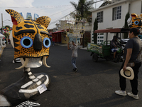 Residents of Santa Cecilia Tlahuac in Mexico City, Mexico, place pre-Hispanic decorations on public roads and houses on the eve of the Day o...