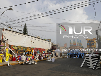 Residents of Santa Cecilia Tlahuac in Mexico City decorate public roads and houses on the eve of the Day of the Dead in Mexico City, on Octo...