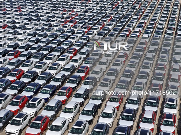 A large number of Chinese-made vehicles gather at Yantai Port waiting to be loaded for export in Yantai, Shandong province, China, on Octobe...