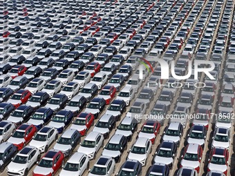 A large number of Chinese-made vehicles gather at Yantai Port waiting to be loaded for export in Yantai, Shandong province, China, on Octobe...