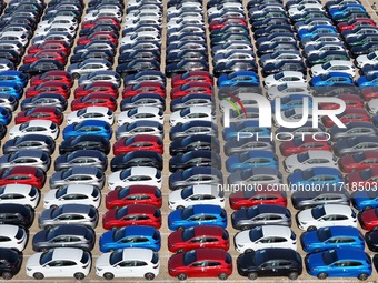 A large number of Chinese-made vehicles gather at Yantai Port waiting to be loaded for export in Yantai, Shandong province, China, on Octobe...