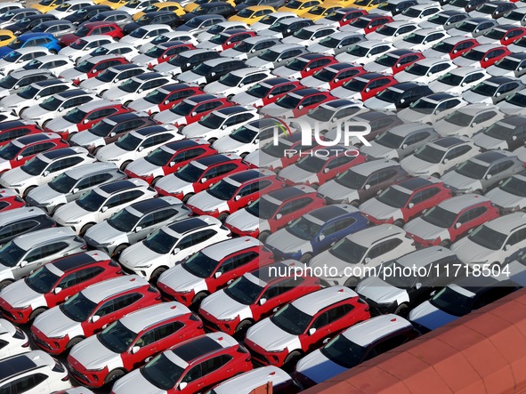 A large number of Chinese-made vehicles gather at Yantai Port waiting to be loaded for export in Yantai, Shandong province, China, on Octobe...