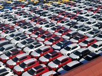 A large number of Chinese-made vehicles gather at Yantai Port waiting to be loaded for export in Yantai, Shandong province, China, on Octobe...