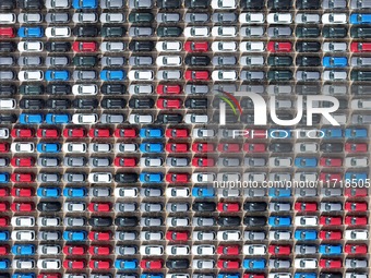 A large number of Chinese-made vehicles gather at Yantai Port waiting to be loaded for export in Yantai, Shandong province, China, on Octobe...