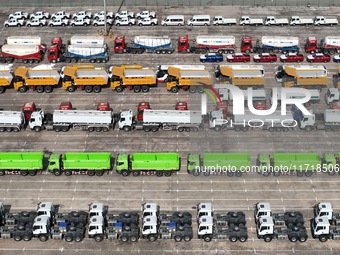 A large number of Chinese-made vehicles gather at Yantai Port waiting to be loaded for export in Yantai, Shandong province, China, on Octobe...