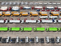 A large number of Chinese-made vehicles gather at Yantai Port waiting to be loaded for export in Yantai, Shandong province, China, on Octobe...