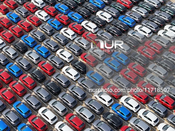 A large number of Chinese-made vehicles gather at Yantai Port waiting to be loaded for export in Yantai, Shandong province, China, on Octobe...