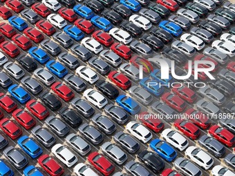 A large number of Chinese-made vehicles gather at Yantai Port waiting to be loaded for export in Yantai, Shandong province, China, on Octobe...