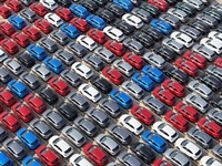 A large number of Chinese-made vehicles gather at Yantai Port waiting to be loaded for export in Yantai, Shandong province, China, on Octobe...