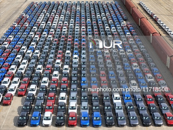 A large number of Chinese-made vehicles gather at Yantai Port waiting to be loaded for export in Yantai, Shandong province, China, on Octobe...