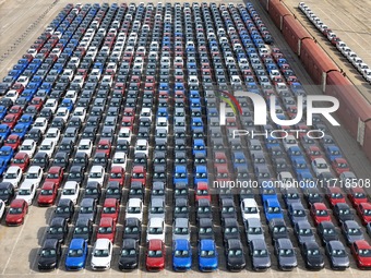 A large number of Chinese-made vehicles gather at Yantai Port waiting to be loaded for export in Yantai, Shandong province, China, on Octobe...