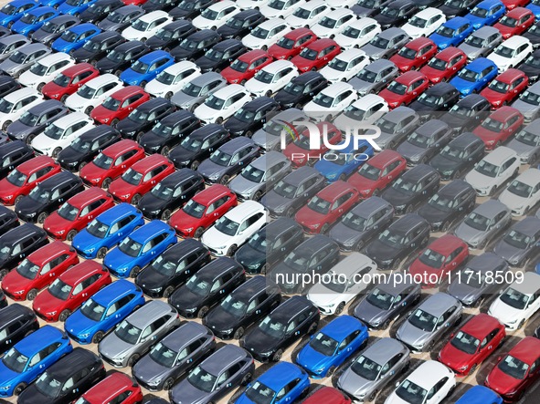 A large number of Chinese-made vehicles gather at Yantai Port waiting to be loaded for export in Yantai, Shandong province, China, on Octobe...