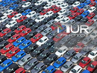 A large number of Chinese-made vehicles gather at Yantai Port waiting to be loaded for export in Yantai, Shandong province, China, on Octobe...