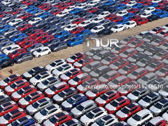 A large number of Chinese-made vehicles gather at Yantai Port waiting to be loaded for export in Yantai, Shandong province, China, on Octobe...